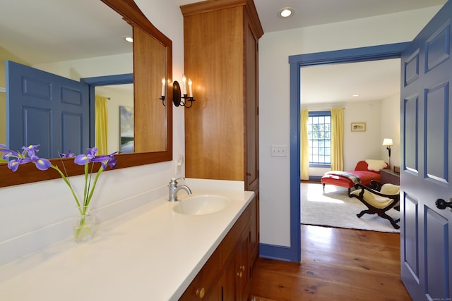 40 Shields Rd, Woodstock, CT 06281 - bathroom featuring wood finished floors, vanity, and recessed lighting