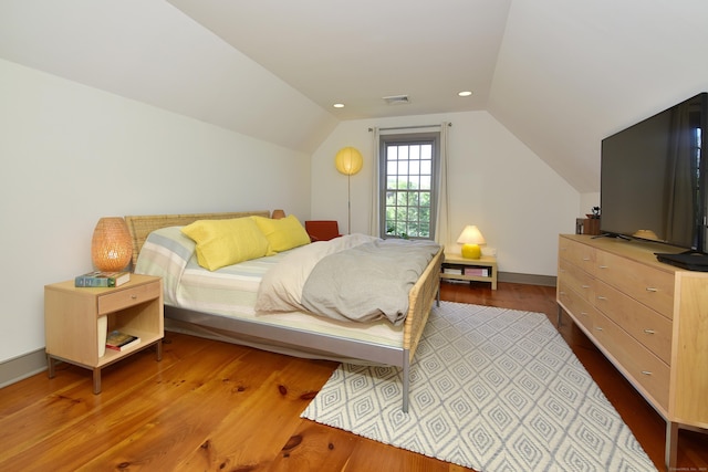 40 Shields Rd, Woodstock, CT 06281 - bedroom featuring wood finished floors, vaulted ceiling, baseboards, and recessed lighting