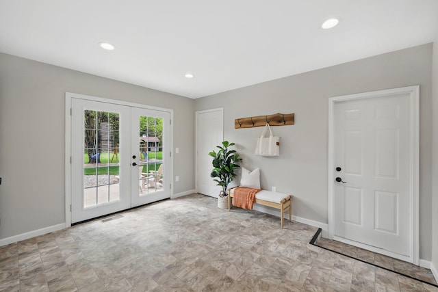doorway to outside with french doors, baseboards, and recessed lighting