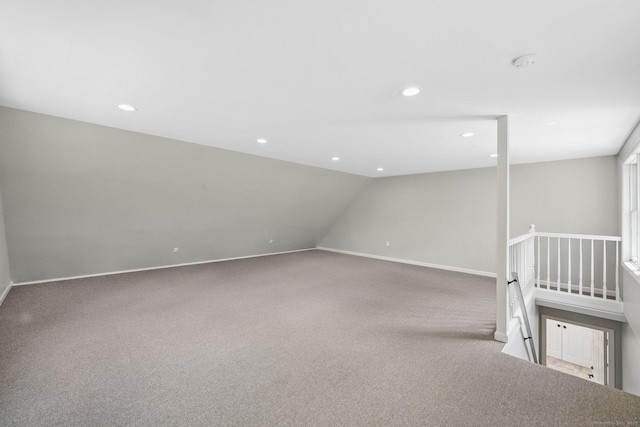 bonus room featuring carpet floors, baseboards, recessed lighting, and vaulted ceiling