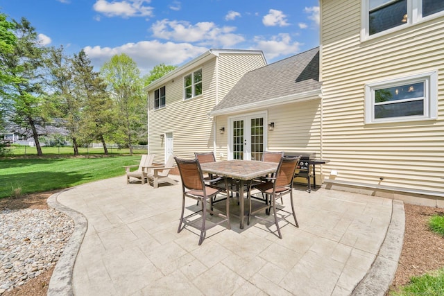 view of patio with french doors and outdoor dining space