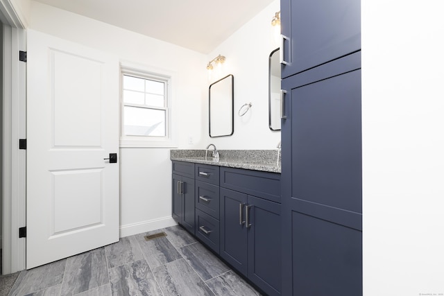25 Oakwood Cir Unit 7, Plainville, CT 06062 - bathroom with vanity and baseboards