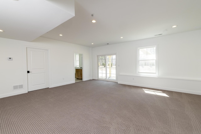 25 Oakwood Cir Unit 7, Plainville, CT 06062 - spare room featuring visible vents, recessed lighting, and dark colored carpet