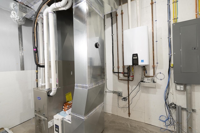 25 Oakwood Cir Unit 7, Plainville, CT 06062 - utility room with tankless water heater, heating unit, and electric panel