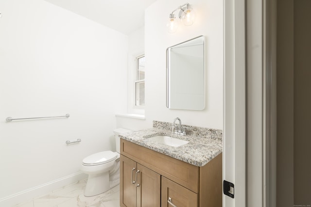 25 Oakwood Cir Unit 7, Plainville, CT 06062 - bathroom featuring vanity, marble finish floor, baseboards, and toilet