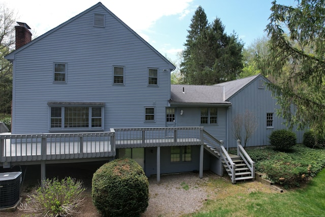 32 Woodmont Rd, Avon, CT 06001 - back of house with stairway, a deck, central AC unit, a chimney, and roof with shingles