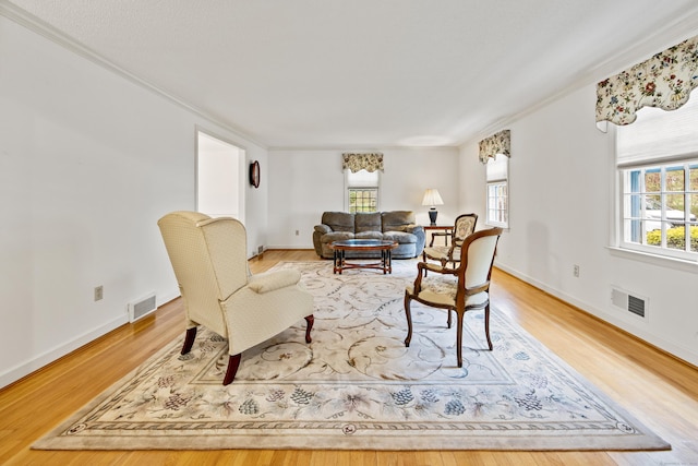 32 Woodmont Rd, Avon, CT 06001 - living room featuring ornamental molding, wood finished floors, and baseboards