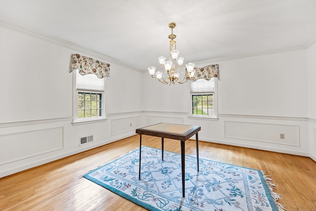 32 Woodmont Rd, Avon, CT 06001 - office featuring healthy amount of natural light, crown molding, a chandelier, wood-type flooring, and a wainscoted wall