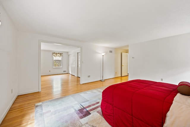 32 Woodmont Rd, Avon, CT 06001 - bedroom with light wood-style floors and baseboards