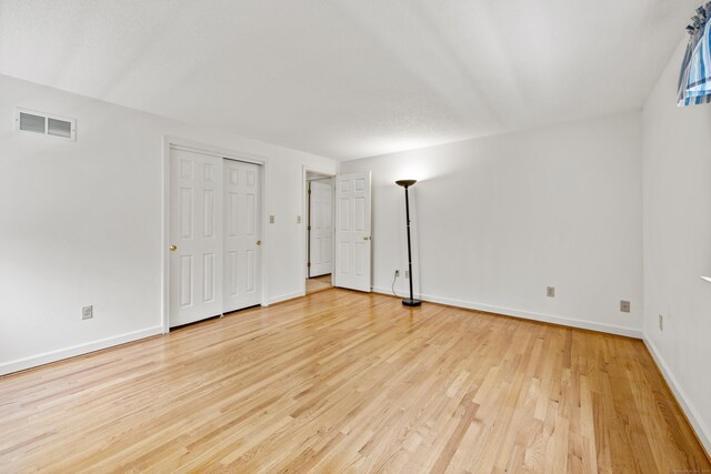 32 Woodmont Rd, Avon, CT 06001 - unfurnished bedroom featuring light wood-type flooring and baseboards