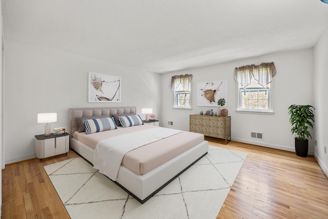 32 Woodmont Rd, Avon, CT 06001 - bedroom featuring light wood-type flooring and baseboards