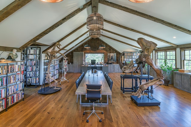 recreation room with lofted ceiling with beams and wood-type flooring