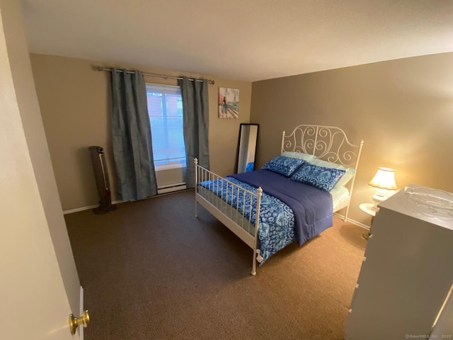 bedroom featuring a baseboard radiator, baseboards, and carpet