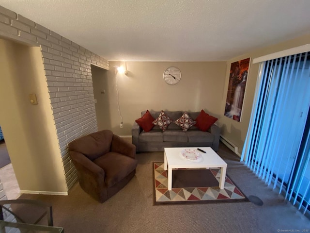 carpeted living area featuring a baseboard radiator, a textured ceiling, and brick wall