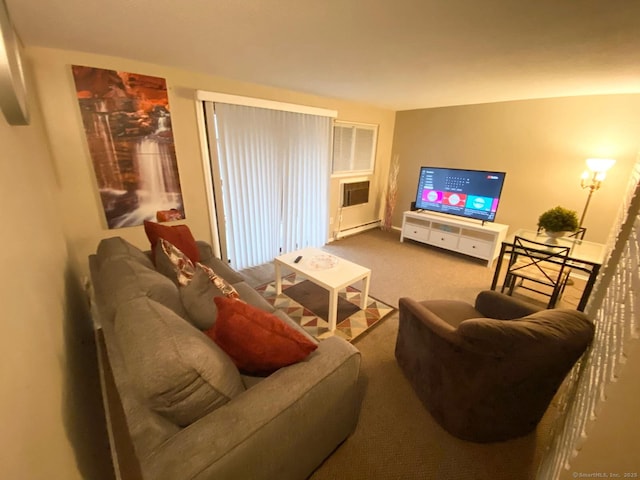 carpeted living area featuring a baseboard heating unit