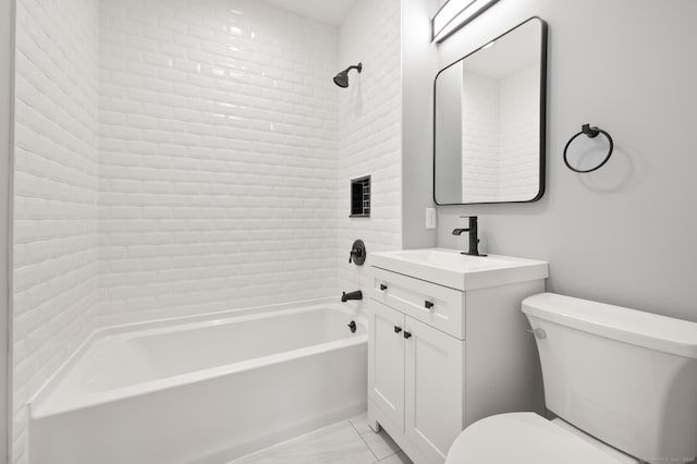 bathroom with washtub / shower combination, toilet, marble finish floor, and vanity
