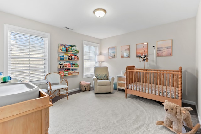 bedroom with baseboards and carpet flooring