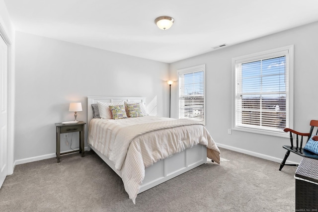 bedroom featuring visible vents, baseboards, and carpet flooring