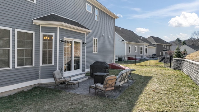 view of yard featuring fence and a patio area