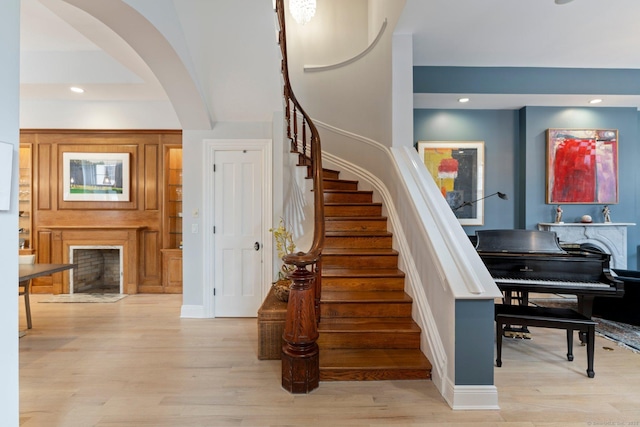 93 Elm St, Hartford, CT 06106 - staircase with wood finished floors, recessed lighting, baseboards, and arched walkways