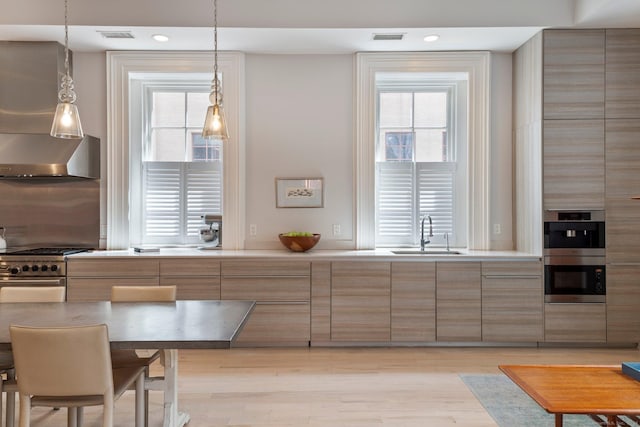 93 Elm St, Hartford, CT 06106 - kitchen with appliances with stainless steel finishes, light countertops, plenty of natural light, and a sink