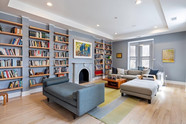 93 Elm St, Hartford, CT 06106 - living room featuring visible vents, wood finished floors, and a raised ceiling