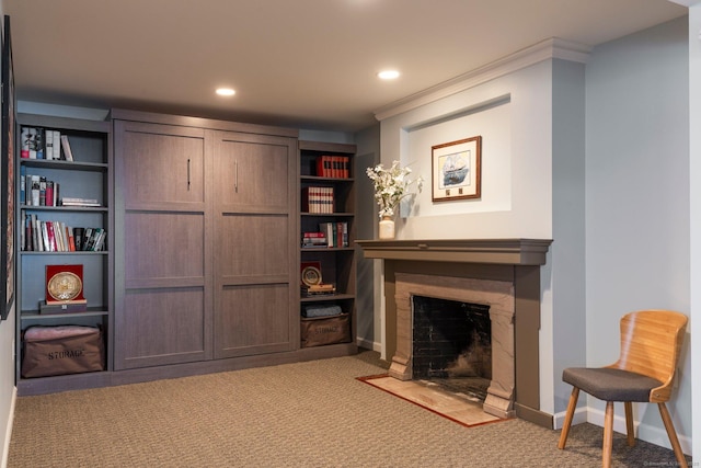 93 Elm St, Hartford, CT 06106 - living area with a fireplace with flush hearth, crown molding, baseboards, recessed lighting, and carpet
