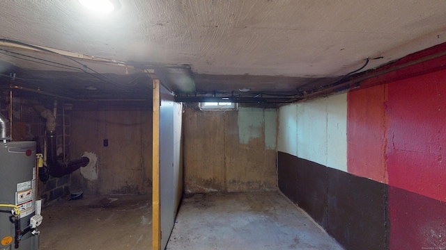 unfinished below grade area with gas water heater