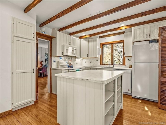 5 Old Pawson Rd, Branford, CT 06405 - kitchen featuring beamed ceiling, light wood finished floors, a center island, white appliances, and light countertops