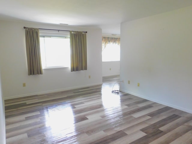 201 Windgate Cir Unit A, Monroe, CT 06468 - unfurnished room with wood finished floors and baseboards