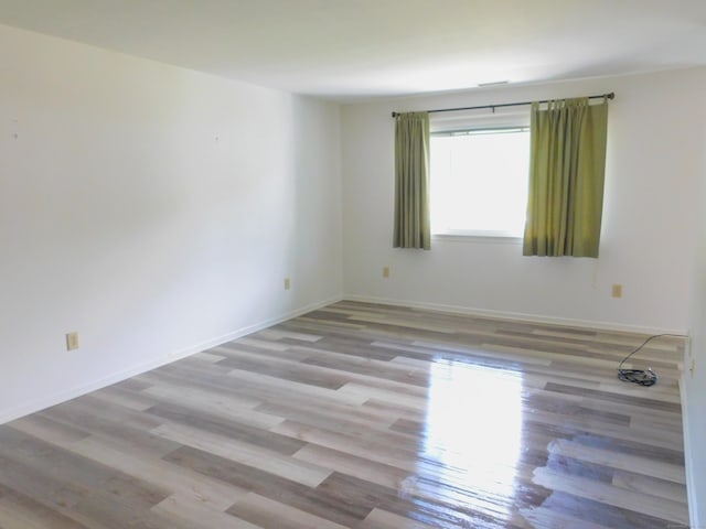 201 Windgate Cir Unit A, Monroe, CT 06468 - unfurnished room featuring wood finished floors and baseboards