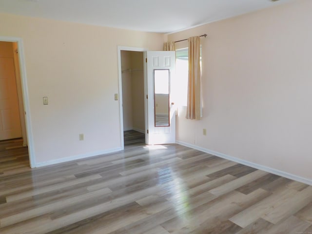 201 Windgate Cir Unit A, Monroe, CT 06468 - empty room with light wood-style flooring and baseboards