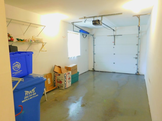 201 Windgate Cir Unit A, Monroe, CT 06468 - garage featuring a garage door opener