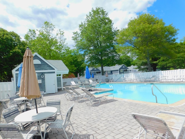 201 Windgate Cir Unit A, Monroe, CT 06468 - community pool featuring a patio area and an outdoor structure