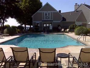 pool with a patio