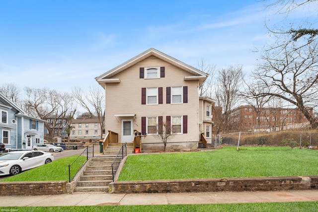 126 Pleasant St, Meriden, CT 06450 - view of front of home featuring a front yard and fence
