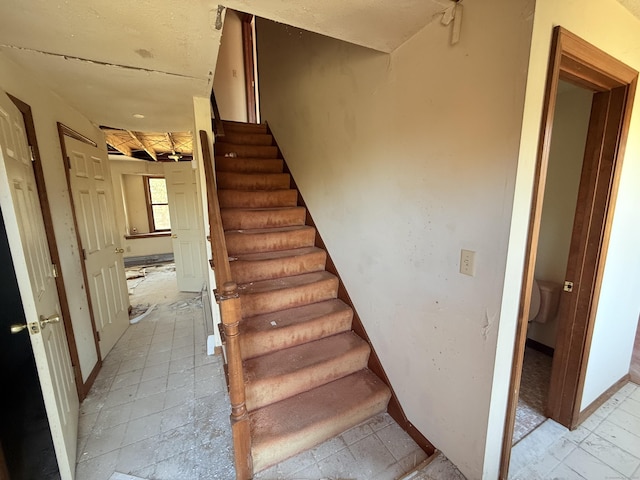 stairs with baseboards