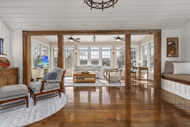sitting room featuring wood finished floors and a ceiling fan
