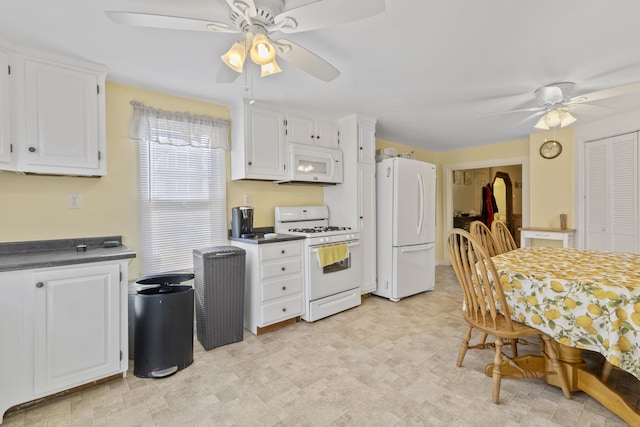 31 Old Colony Rd, Old Lyme, CT 06371 - kitchen featuring ceiling fan, white cabinetry, white appliances, dark countertops, and light floors