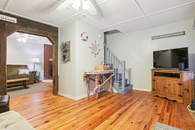 31 Old Colony Rd, Old Lyme, CT 06371 - living area with baseboards, hardwood / wood-style flooring, a ceiling fan, and stairs