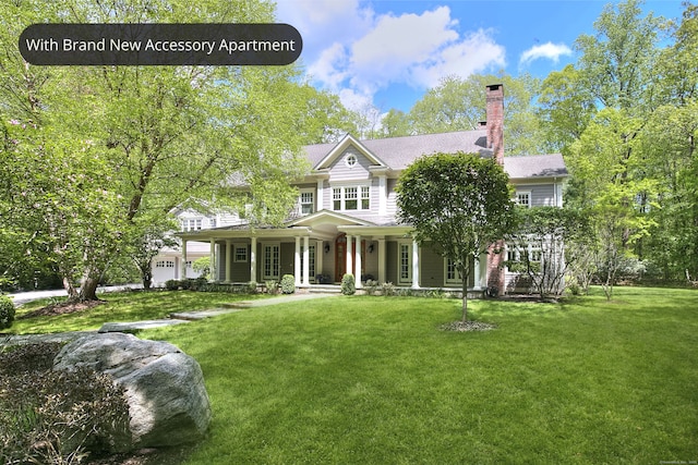 6 Florian Ct, Westport, CT 06880 - view of front of property featuring covered porch, a front lawn, and a chimney