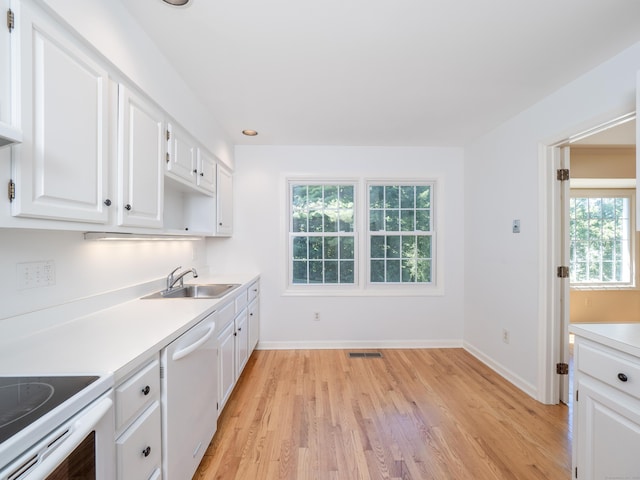 19 Prospect Rdg Apt 16, Ridgefield, CT 06877 - kitchen featuring dishwasher, light wood-style floors, and white cabinetry