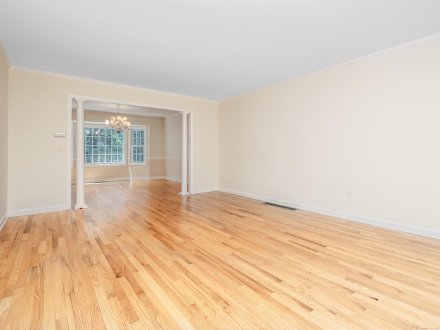 19 Prospect Rdg Apt 16, Ridgefield, CT 06877 - unfurnished room featuring a chandelier, light wood finished floors, and ornamental molding