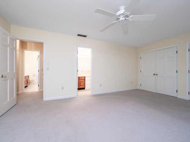 19 Prospect Rdg Apt 16, Ridgefield, CT 06877 - unfurnished bedroom with light colored carpet, ensuite bath, a closet, and ceiling fan