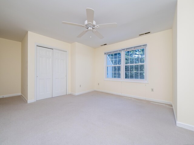 19 Prospect Rdg Apt 16, Ridgefield, CT 06877 - unfurnished bedroom with light colored carpet, a closet, and a ceiling fan