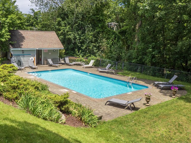 19 Prospect Rdg Apt 16, Ridgefield, CT 06877 - community pool with a patio and an outbuilding