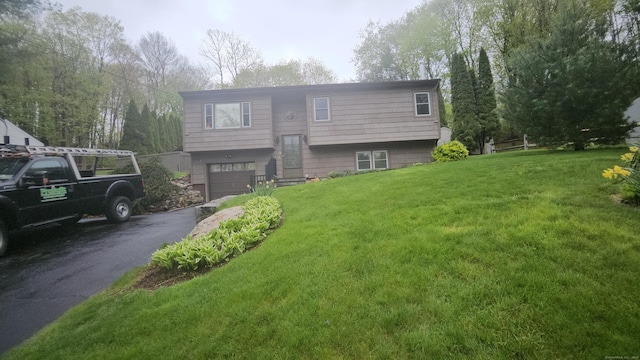 35 Kayview Ave, Bethel, CT 06801 - split foyer home with driveway, an attached garage, and a front lawn