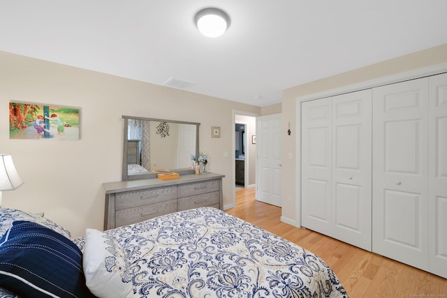 12 Nevins Ave, Enfield, CT 06082 - bedroom with light wood finished floors and a closet