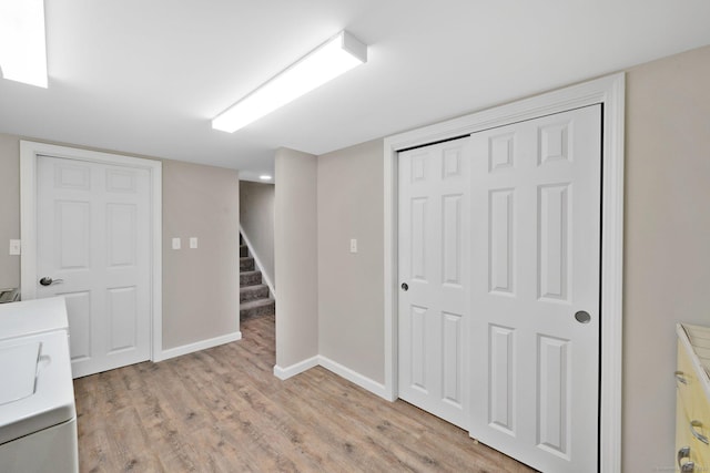 12 Nevins Ave, Enfield, CT 06082 - finished below grade area with light wood finished floors, stairs, and washer / clothes dryer