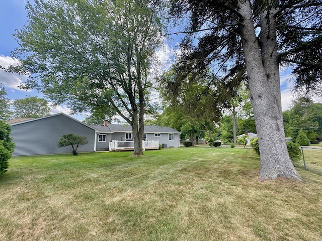 12 Nevins Ave, Enfield, CT 06082 - view of grassy yard with a wooden deck